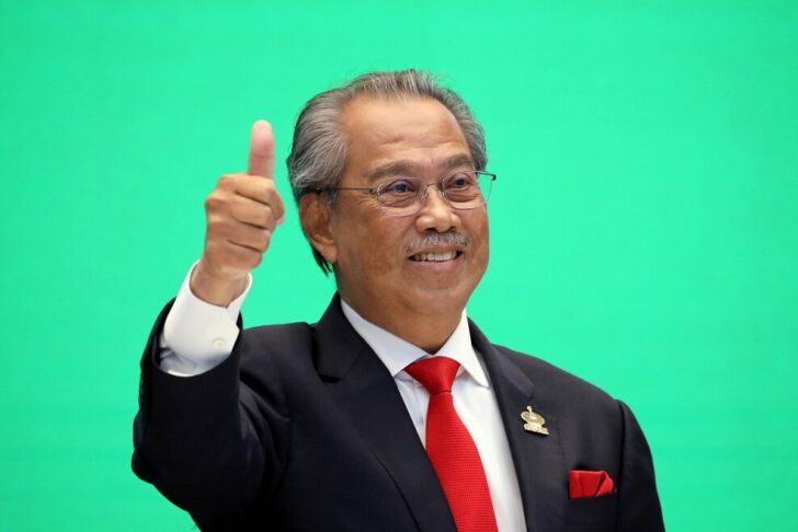 FILE PHOTO: Malaysia's Prime Minister Muhyiddin Yassin gestures during virtual APEC Economic Leaders Meeting 2020, in Kuala Lumpur