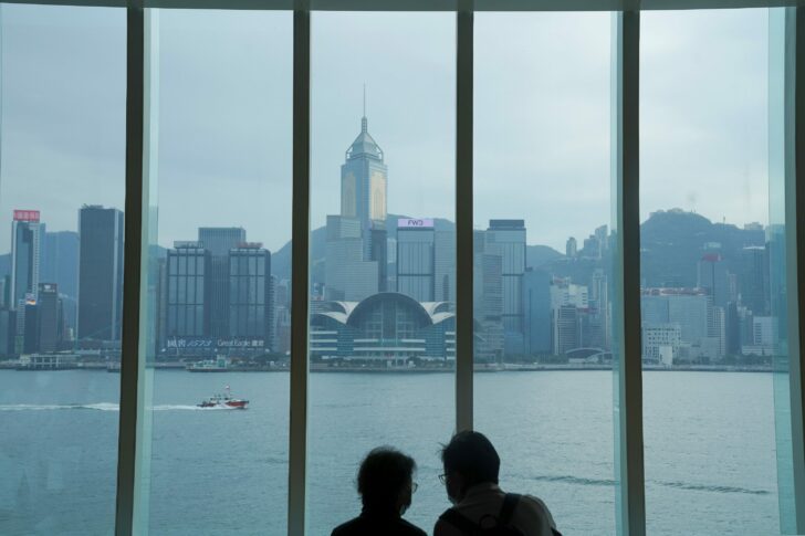 Visitors sit inside Hong Kong Museum of Art in Hong Kong