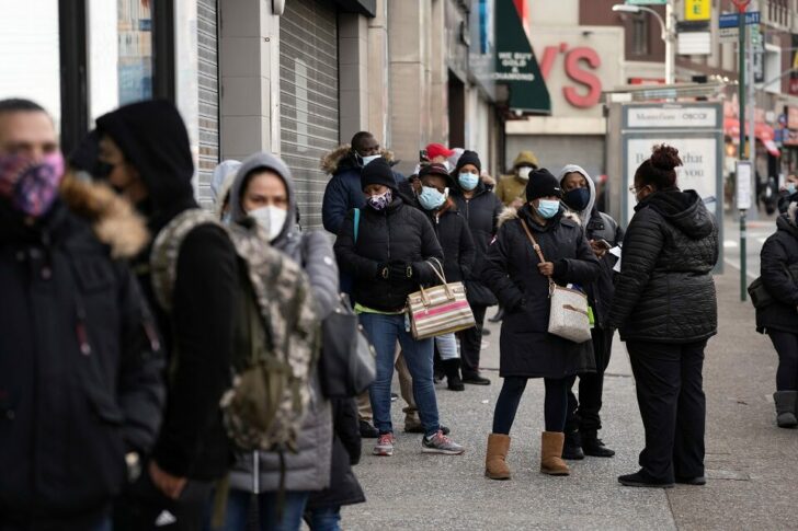 People wait in line to get tested for the coronavirus disease (COVID-19) in the Bronx