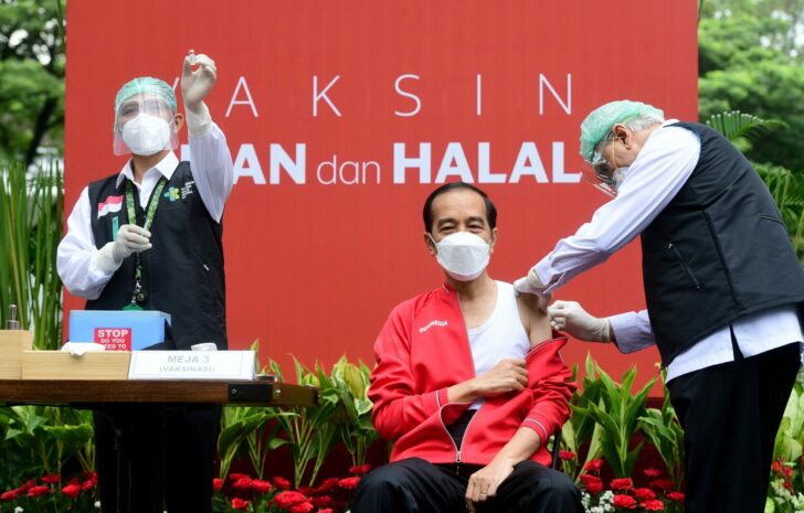 Indonesia’s President Joko Widodo is pictured while receiving the second dose of Sinovac's COVID-19 vaccine at the Presidential Palace in Jakarta