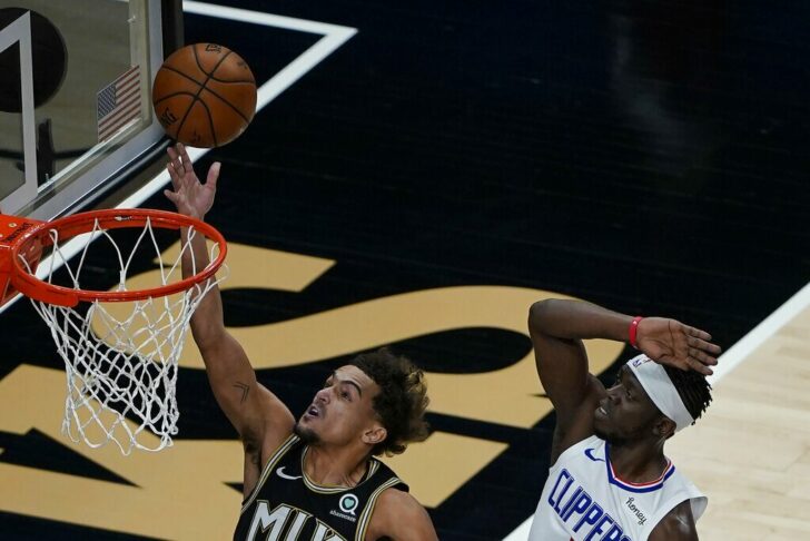 Trae Young, Reggie Jackson