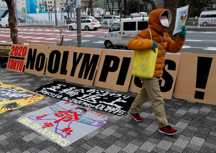 FILE PHOTO: Protesters hold a rally to demand a cancellation of the 2020 Tokyo Olympic Games in Tokyo