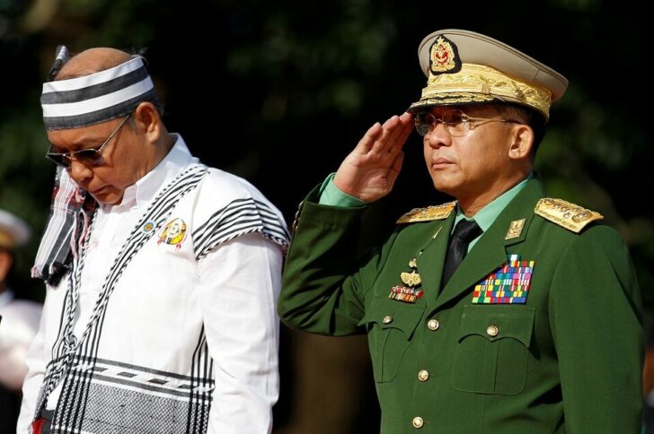 FILE PHOTO: Myanmar Military Chief General Min Aung Hlaing and Mahn Win Khaing Than, speaker of Upper House of Parliament, attend an event marking the 69th anniversary of Martyrs' Day in Yangon
