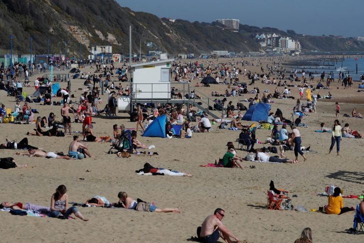 People enjoy the hot weather at Bournemouth Beach