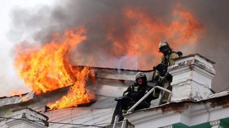 Firefighters work to extinguish a fire at a hospital in Blagoveshchensk