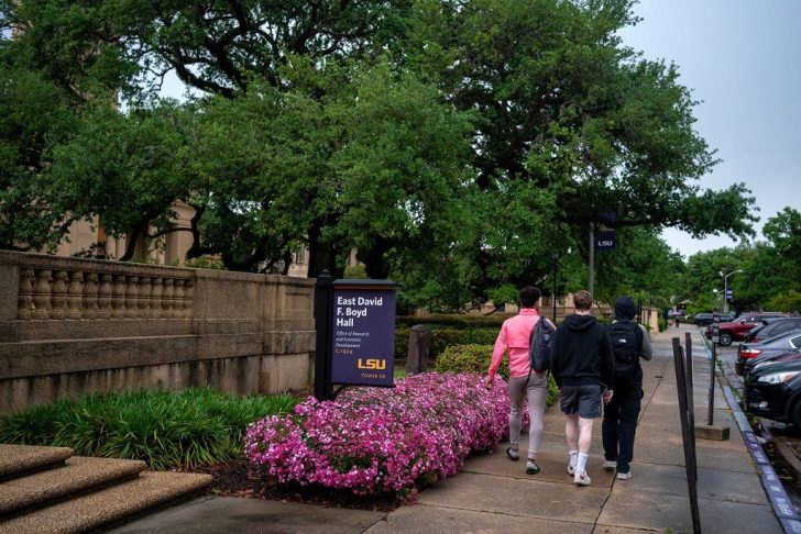 Students walk at the Louisiana State University campus in Baton Rouge