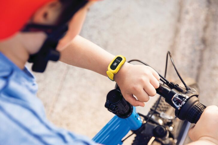 Lifestyle photo of Fitbit Ace 3 Minions band.