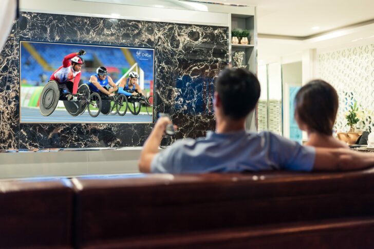 Asian,Couples,Watching,White,Blank,Screen,Display,Television,For,Advertising