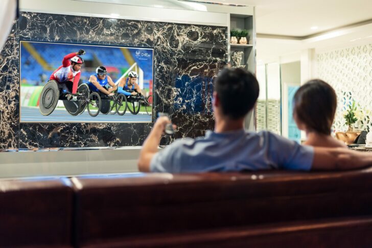Asian,Couples,Watching,White,Blank,Screen,Display,Television,For,Advertising