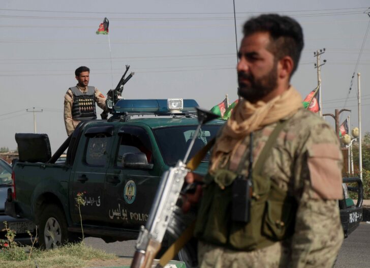 FILE PHOTO: Afghan security forces keep watch at checkpoint in Guzara district of Herat province