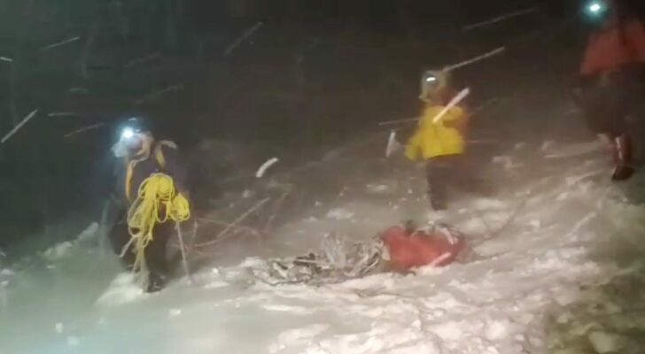 Members of Russia's Emergencies Ministry conduct a rescue operation on the slope of Mount Elbrus
