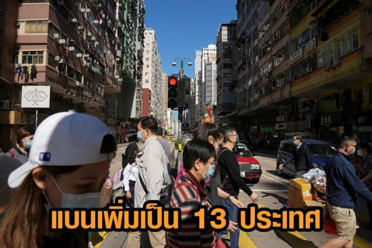 People wearing face masks to prevent the spread of the coronavirus disease (COVID-19), walk on a street in Hong Kong