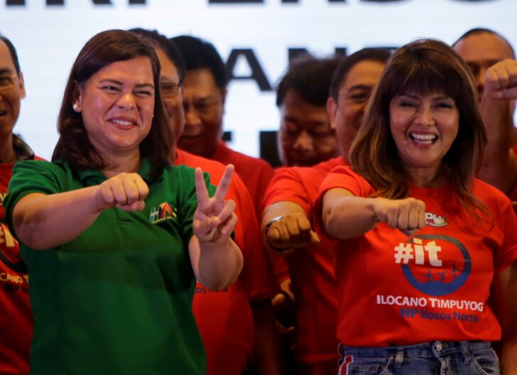 FILE PHOTO: Davao City Mayor Sara Duterte-Carpio (L) and Ilocos Norte Governor Imee Marcos gestures during an alliance meeting with local political parties in Paranaque, Metro Manila