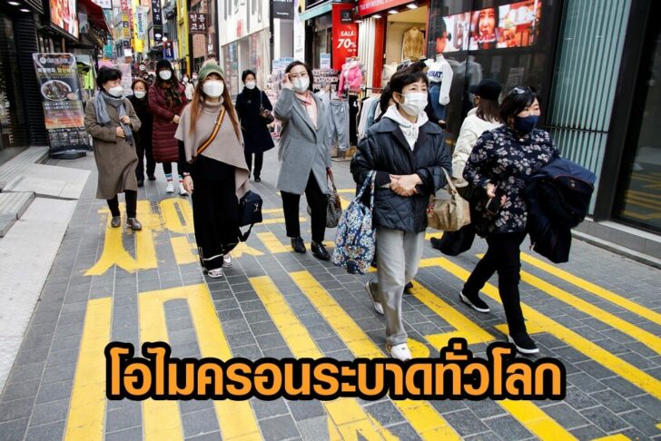 Women wearing masks walk in a shopping district amid the coronavirus disease (COVID-19) pandemic in Seoul