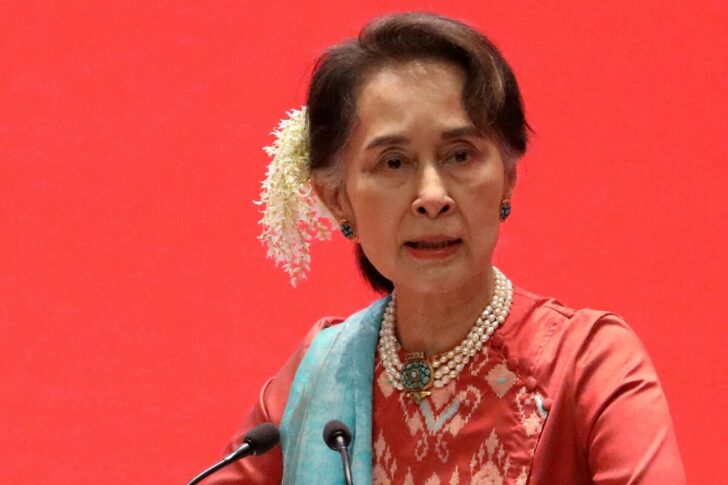 FILE PHOTO: Myanmar's ousted leader Suu Kyi appears in prison uniform in court