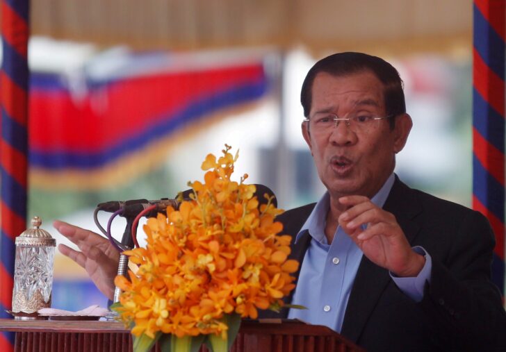 FILE PHOTO: Cambodia's Prime Minister Hun Sen speaks during a groundbreaking ceremony of the Project for Flood Protection, donated by Japan, in Phnom Penh