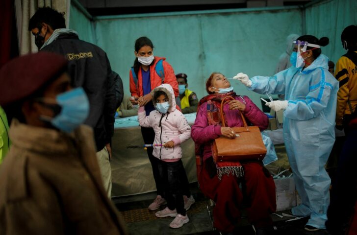 2022-01-06T021048Z_1389720969_RC2TSR91DW8F_RTRMADP_3_HEALTH-CORONAVIRUS-INDIA