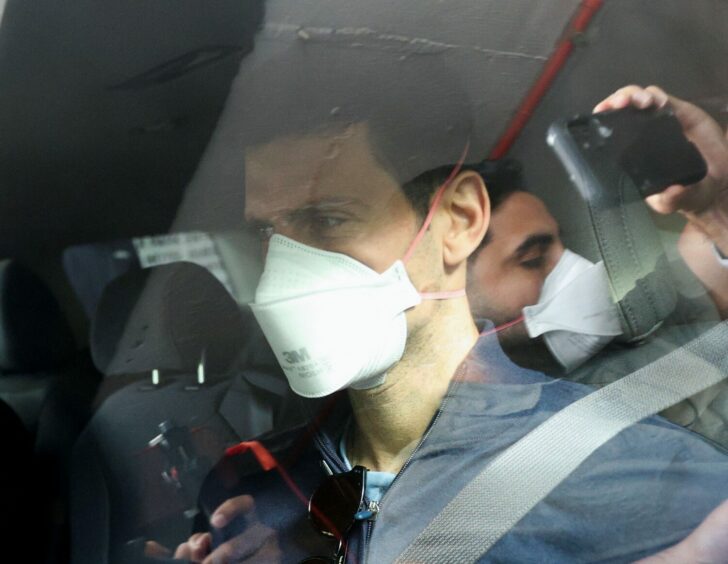 2022-01-15T223210Z_2094944531_RC2XZR9O203I_RTRMADP_3_TENNIS-AUSTRALIA-DJOKOVIC