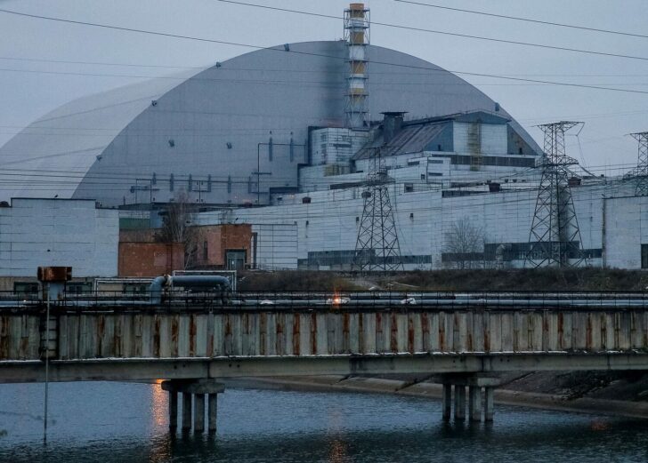 FILE PHOTO: A general view shows the New Safe Confinement structure over the old sarcophagus covering the damaged fourth reactor at the Chernobyl Nuclear Power Plant, in Chernobyl