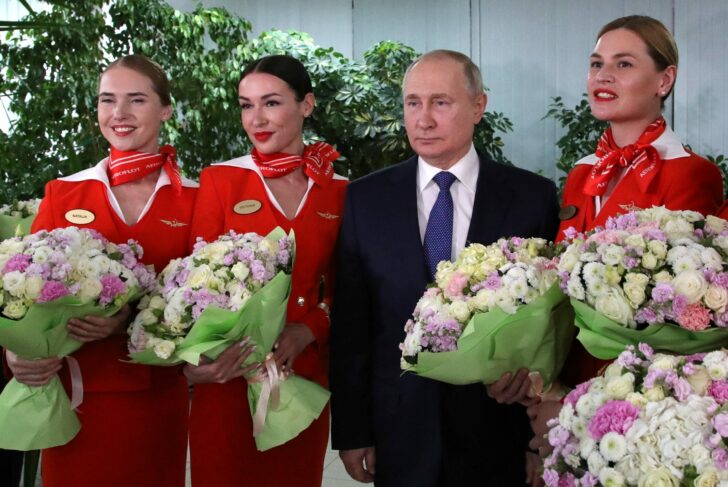 Russian President Putin visits an aviation school in Moscow