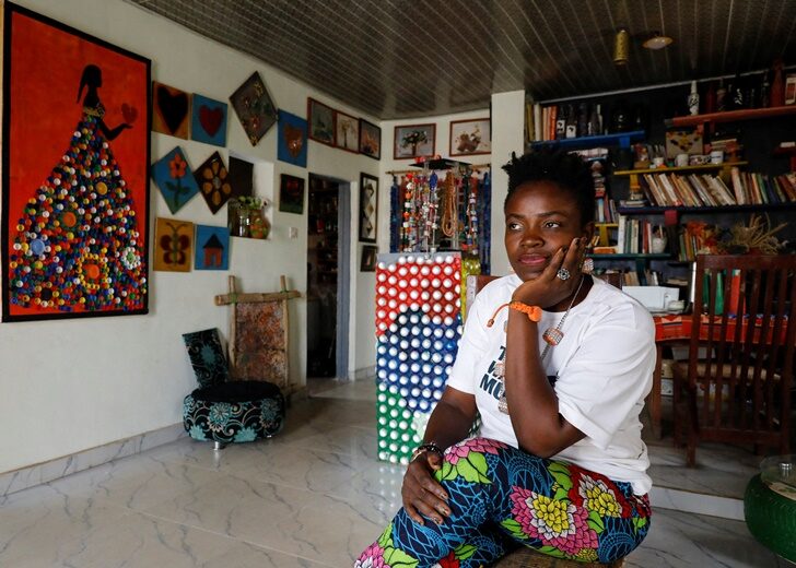 Waste Museum founder Olowookere poses for a photograph after an interview with Reuters at the museum in Ibadan