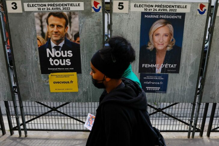 FILE PHOTO: Official campaign posters of French presidential election candidates in Paris