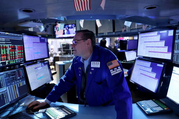 A trader works on the trading floor at the New York Stock Exchange (NYSE) in Manhattan, New York City