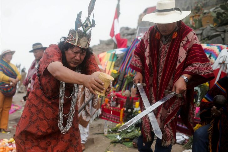 Peruvian shamans perform a ritual for the Peruvian team to qualify for the Qatar 2022 World Cup, in Lima