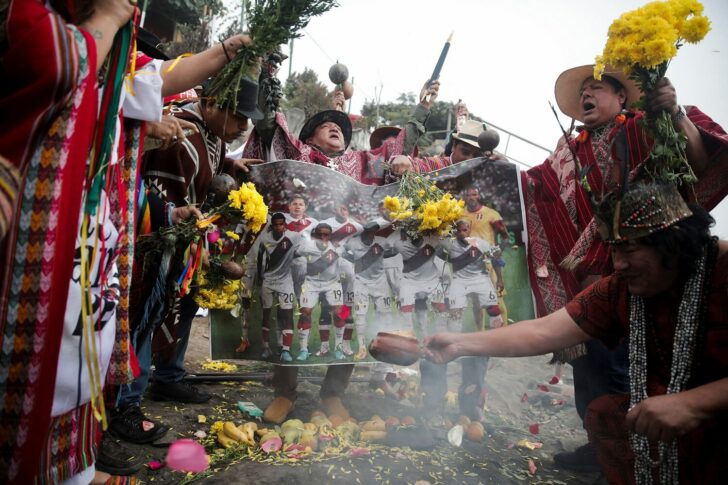 Peruvian shamans perform a ritual for the Peruvian team to qualify for the Qatar 2022 World Cup, in Lima