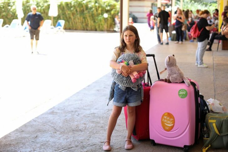 A Ukrainian refugee waits to board a bus in Sunny Beach