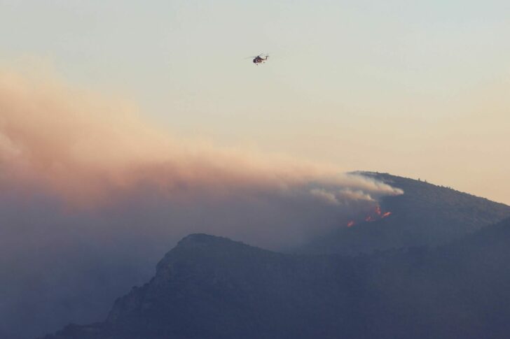 2022-07-13T212807Z_1049743737_RC23BV9JZC77_RTRMADP_3_EUROPE-WEATHER-GREECE-WILDFIRES