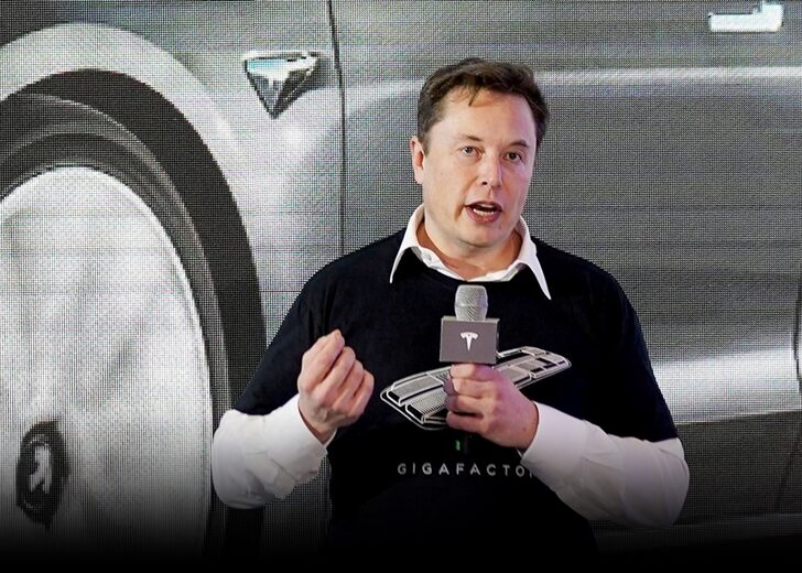 FILE PHOTO: Tesla Inc CEO Elon Musk speaks onstage during a delivery event for Tesla China-made Model 3 cars at its factory in Shanghai