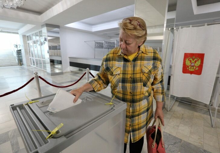 People vote during a referendum on the joining of Russian-controlled regions of Ukraine to Russia, in Sevastopol