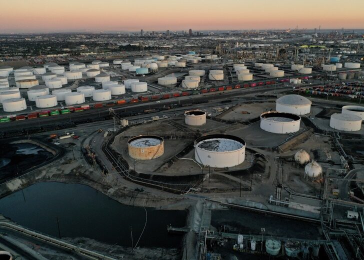 FILE PHOTO: Aerial view of storage tanks at Kinder Morgan Terminal and Phillips 66 Refinery in Carson, California