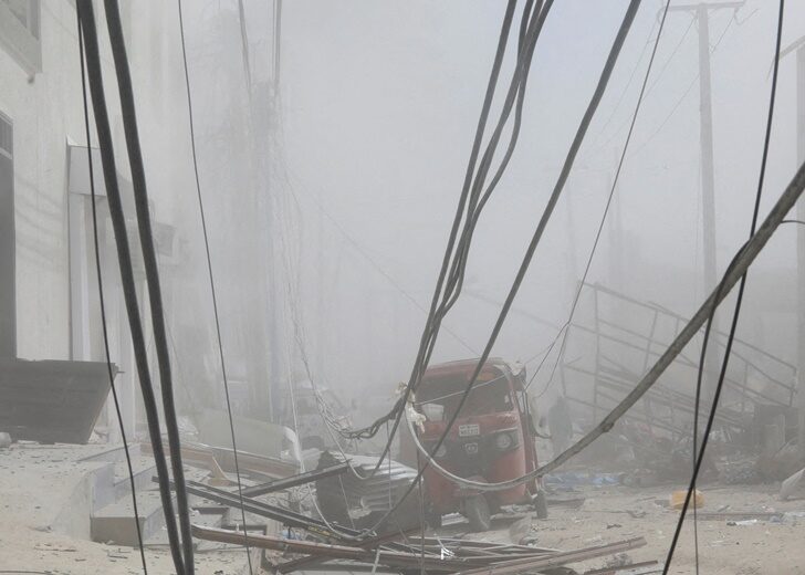 A general view shows the scene of an explosion near the education ministry building along K5 street in Mogadishu