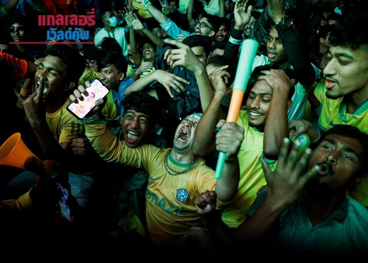 Fans react after Brazil scores a goal during a FIFA World Cup Qatar 2022 match between Brazil and Switzerland on big screen at the University of Dhaka area in Dhaka