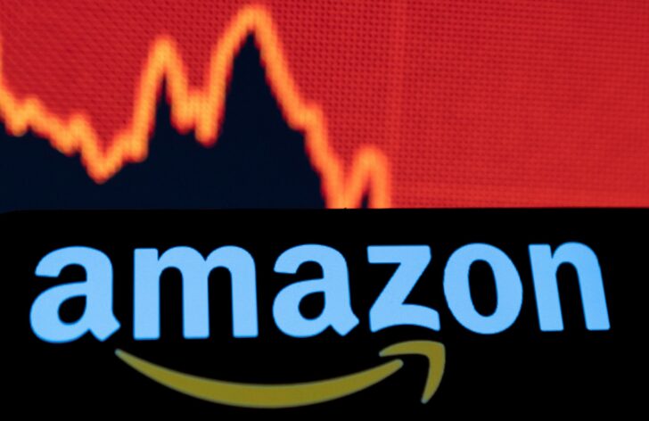 Illustration shows Amazon logo and a decreasing stock graph
