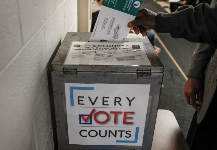 Voters cast their early ballots ahead of the Michgan midterm election in Lansing