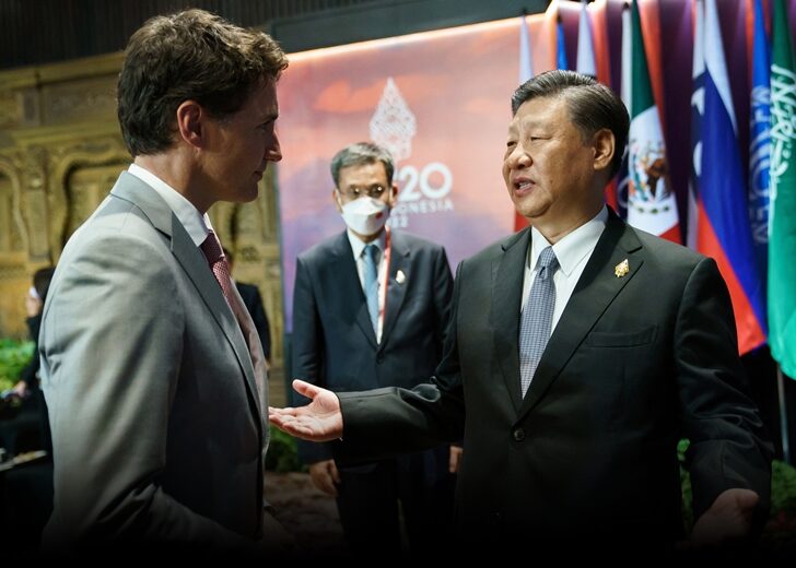 Canada's Prime Minister Justin Trudeau speaks with China's President Xi Jinping at the G20 Leaders' Summit in Bali