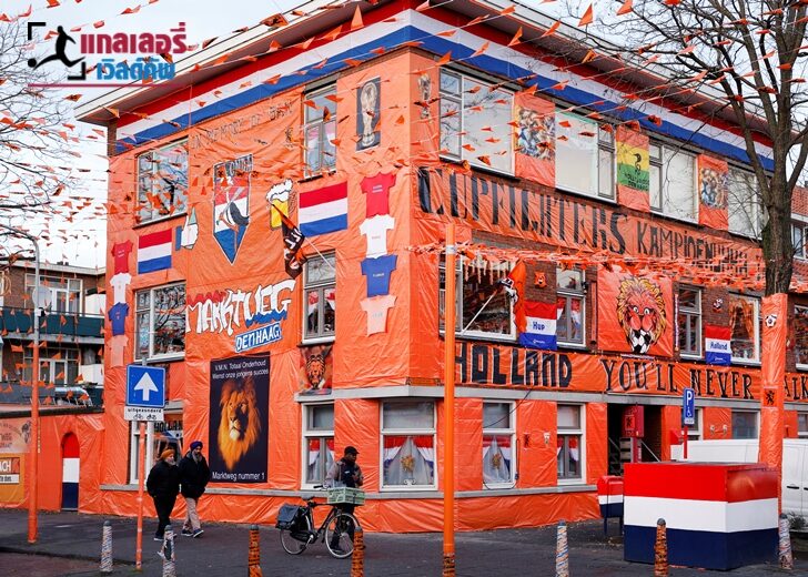 Dutch soccer fans decorate a street in orange to support the World Cup squad in The Hague
