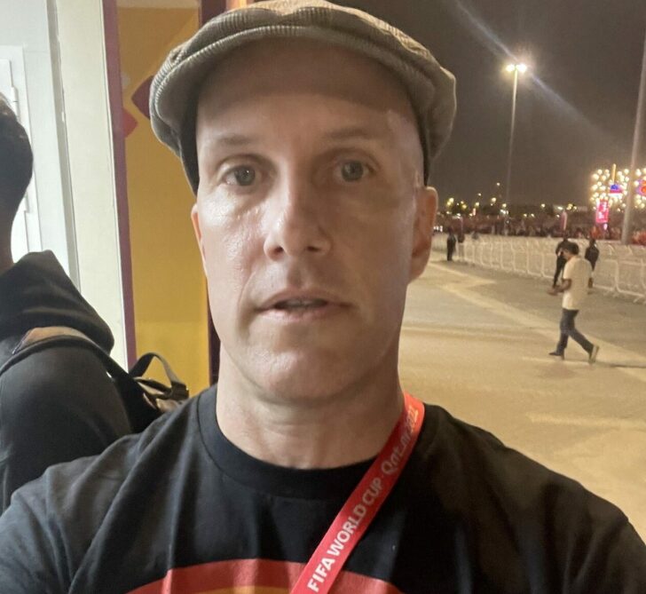 A selfie shows Grant Wahl with a t-shirt supporting LGBTQ rights, who got detained by Qatar World Cup security in Al Rayyan