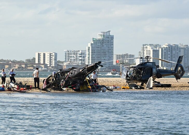 The aftermath of a helicopter collision is seen on the Gold Coast
