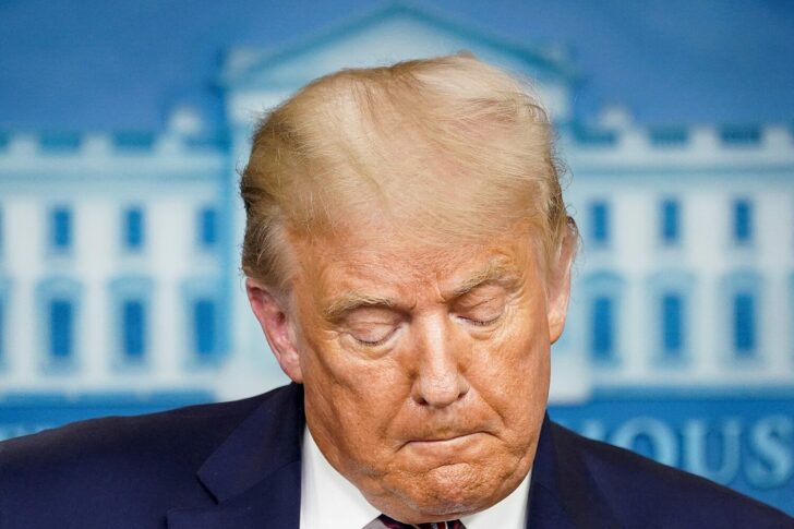 FILE PHOTO: U.S. President Donald Trump pauses as he speaks during a briefing in Washington