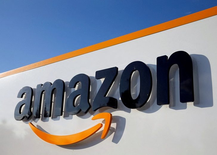 FILE PHOTO: The logo of Amazon is seen at the company logistics centre in Boves