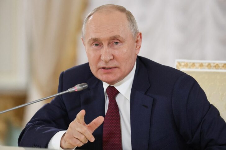 Russia's President Putin attends a press conference in St Petersburg