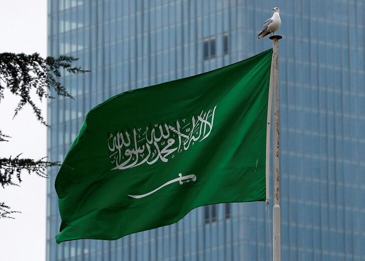FILE PHOTO: A Saudi flag flutters atop Saudi Arabia's consulate in Istanbul