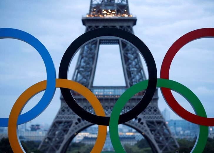 FILE PHOTO: Olympic rings to celebrate the IOC official announcement that Paris won the 2024 Olympic bid are seen in front of the Eiffel Tower at the Trocadero square in Paris