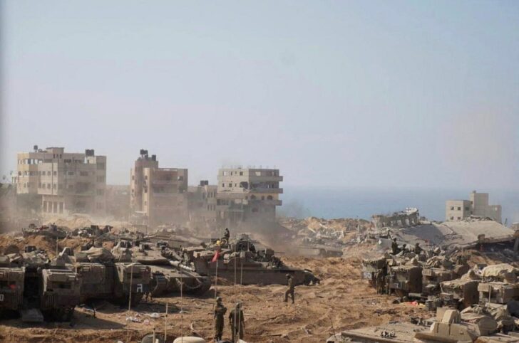 Israeli soldiers and tanks take position inside the Gaza Strip, according to the Israeli Defense Forces