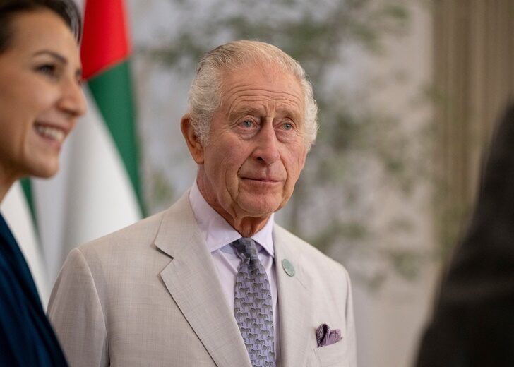 Britain's King Charles speaks with a guest prior to a meeting with President of the United Arab Emirates Sheikh Mohamed bin Zayed Al Nahyan, in Dubai