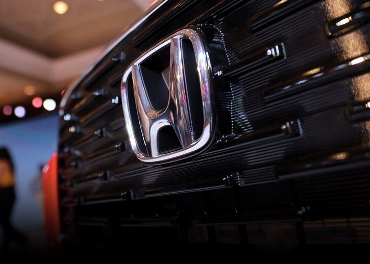 FILE PHOTO: Honda's logo is seen on the front grill of the new SUV Elevate during its world premiere at an event in New Delhi